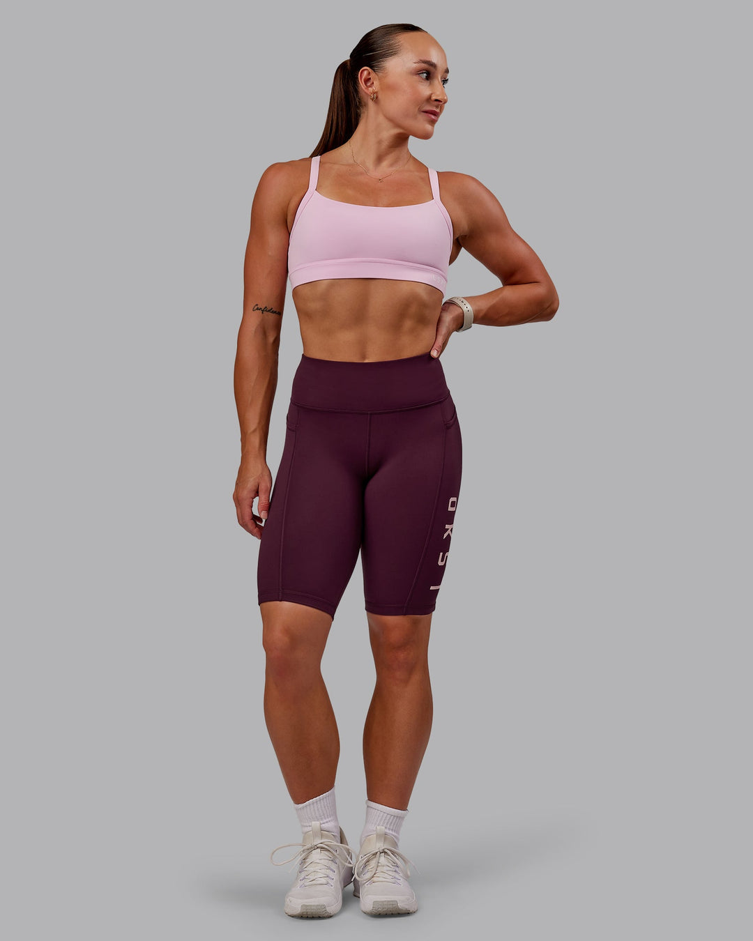 Woman wearing Rep Ultra High-Rise 9" Short Pockets - Cherry Lacquer-Marshmallow