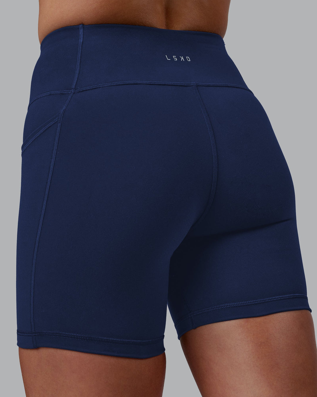 Woman wearing Rep Ultra High-Rise 6" Short Pockets No Logo - Future Navy | Model:Shae | Size:S