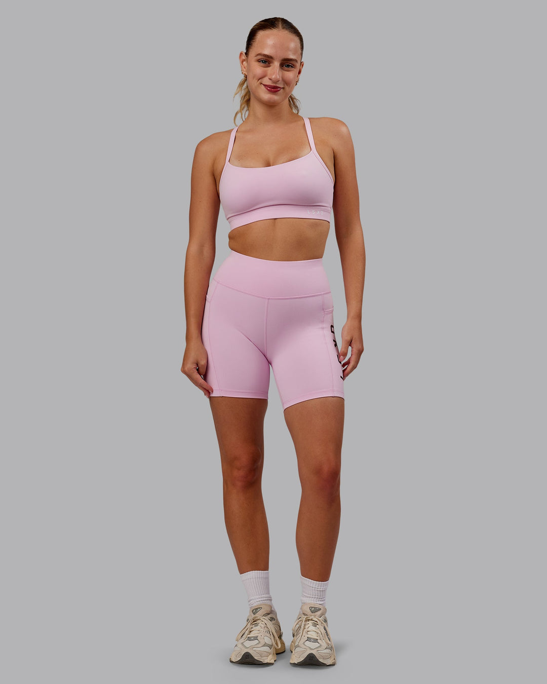 Woman wearing Rep Ultra High-Rise 6" Short Pockets - Marshmallow-Cherry Lacquer