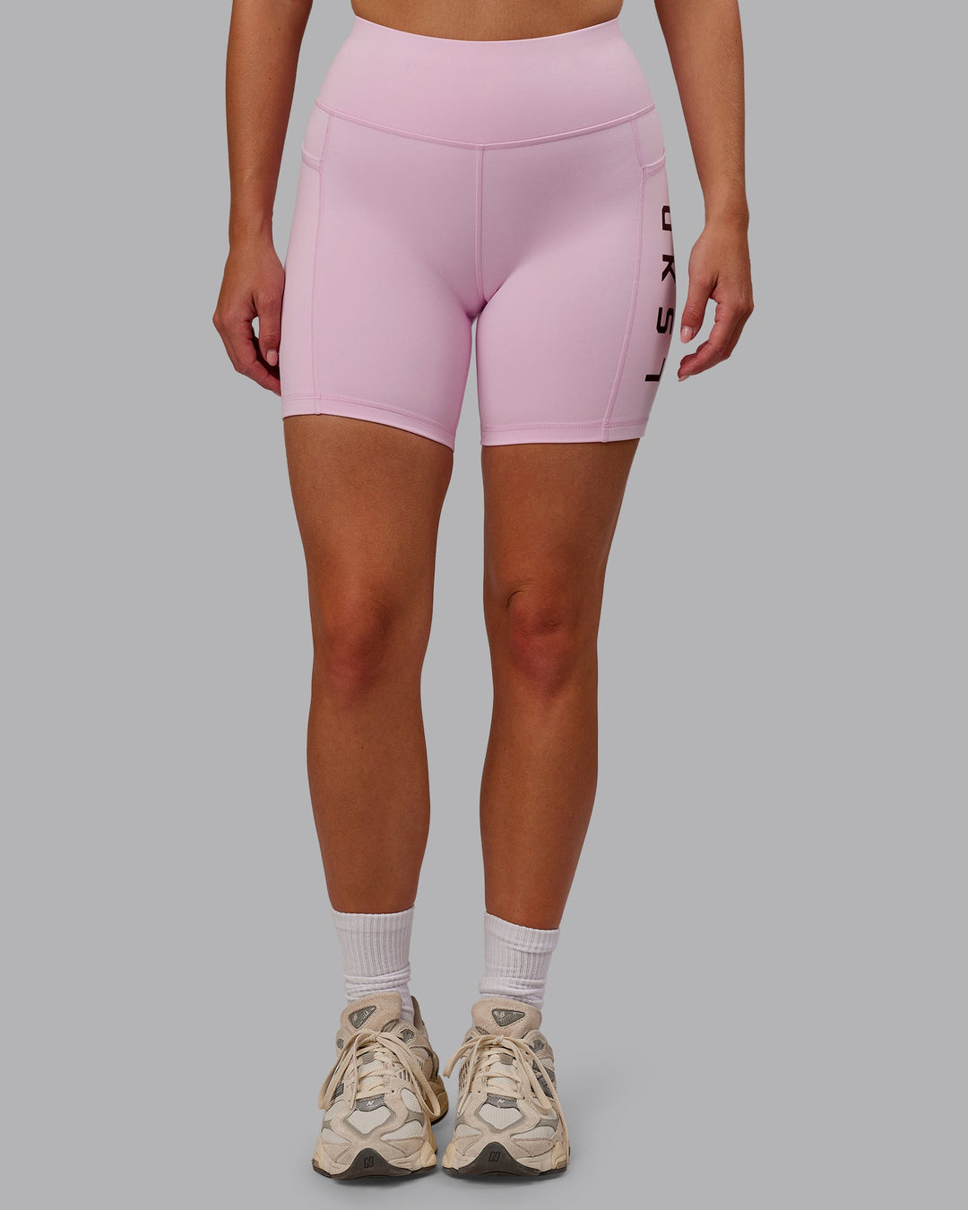 Woman wearing Rep Ultra High-Rise 6" Short Pockets - Marshmallow-Cherry Lacquer