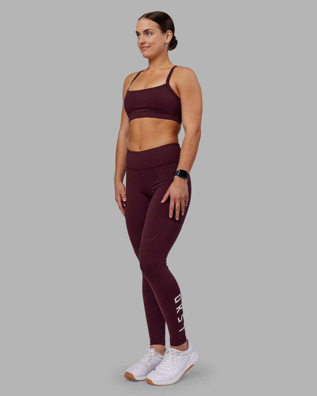 Woman wearing Rep Ultra High-Rise Full Length Legging Pockets - Cherry Lacquer-White | Model:Keisha | Size:S