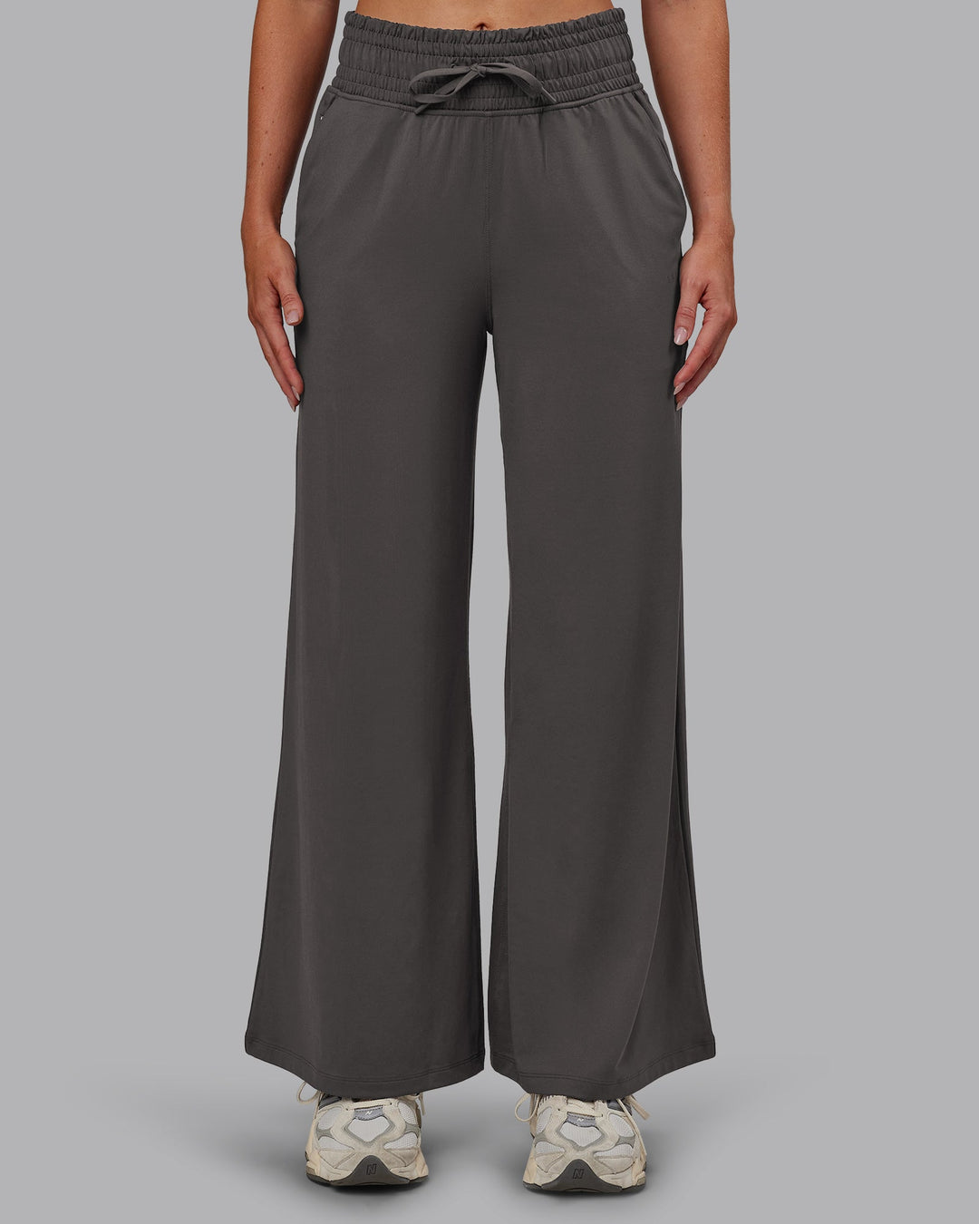 Woman wearing Restore CloudFLX Wide Leg Pant - Dark Storm | Model:Paris | Size:S