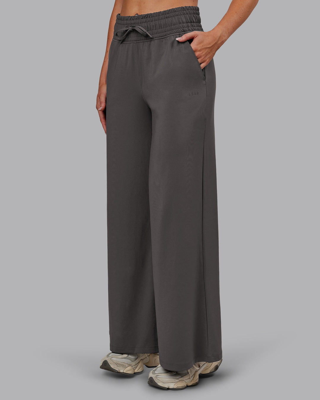 Woman wearing Restore CloudFLX Wide Leg Pant - Dark Storm | Model:Paris | Size:S