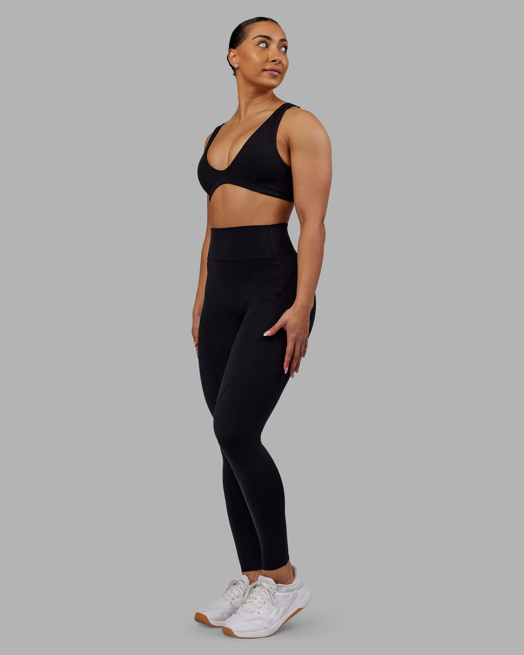 Woman wearing Rhythm Elixir Ultra High-Rise Full Length Legging Pockets - Black | Model:Ayla | Size:S