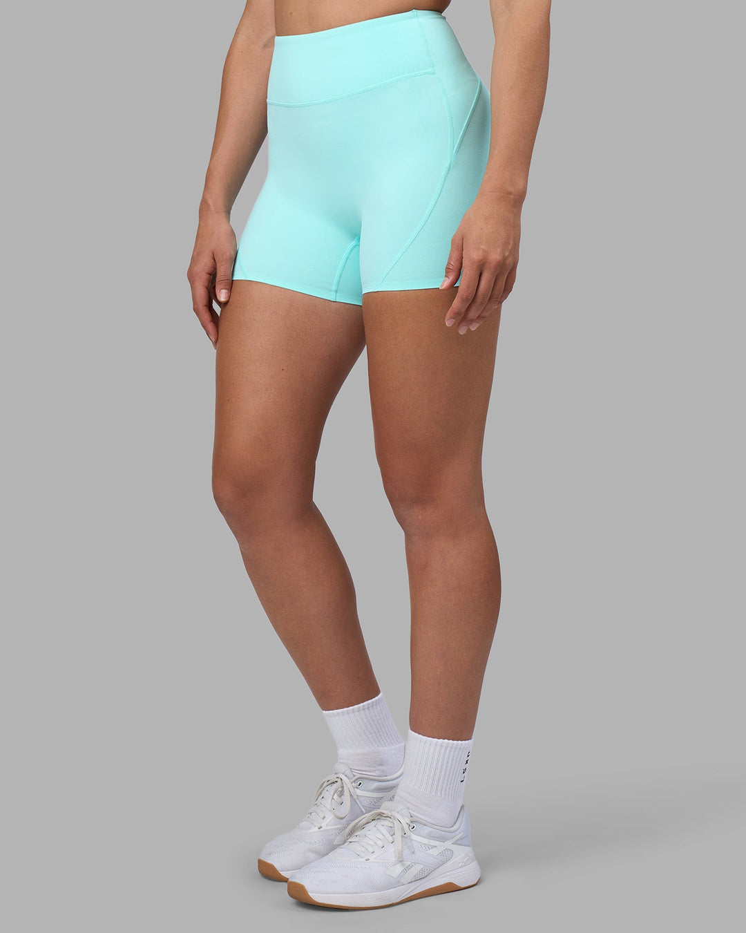 Woman wearing Rhythm Elixir Ultra High-Rise 4" Short - Island Paradise | Model:Sophie | Size:S