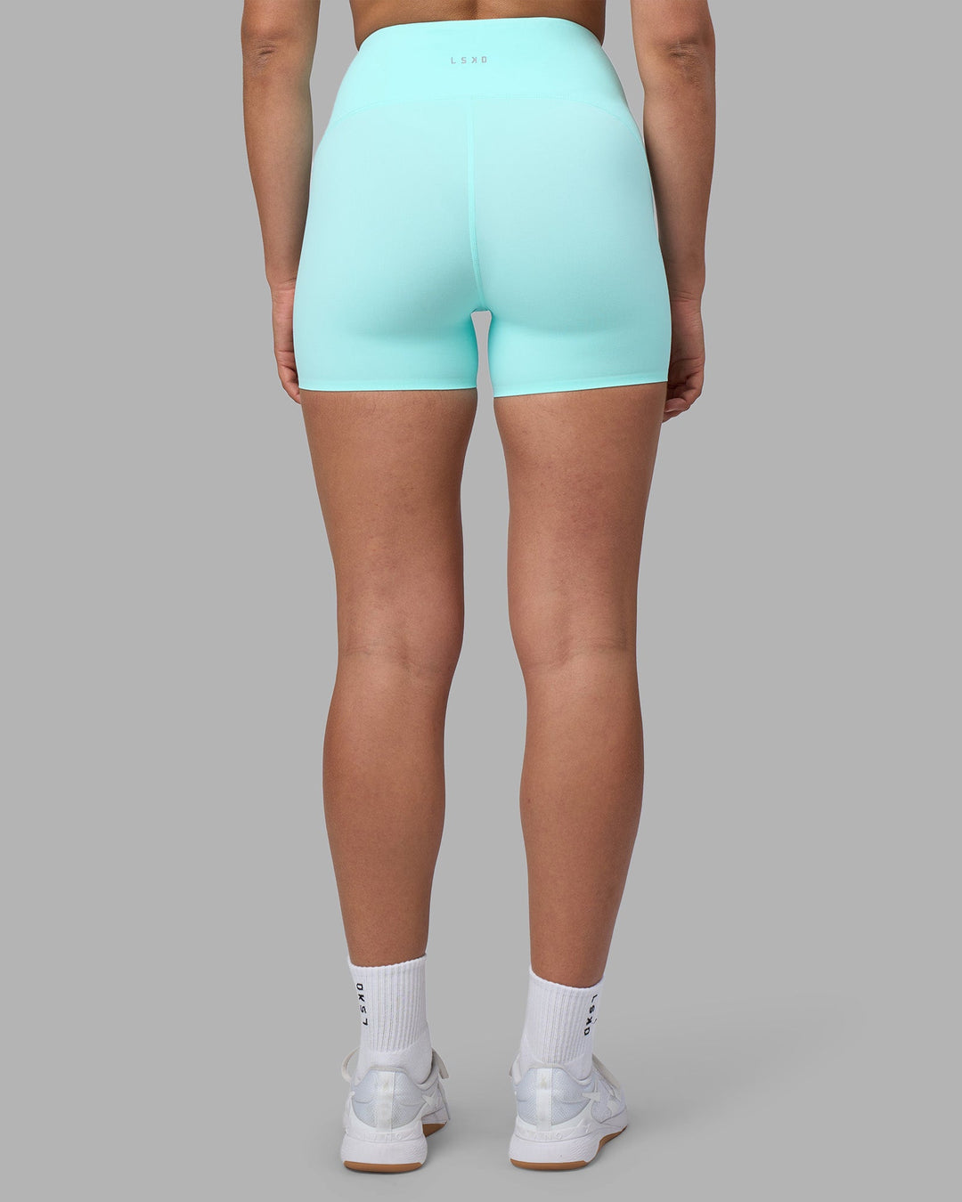 Woman wearing Rhythm Elixir Ultra High-Rise 4" Short - Island Paradise | Model:Sophie | Size:S