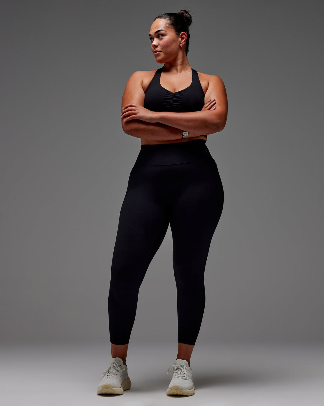 Woman wearing Fusion Ultra High-Rise 7/8 Legging Pockets - Black | Model:Aimee | Size:XL