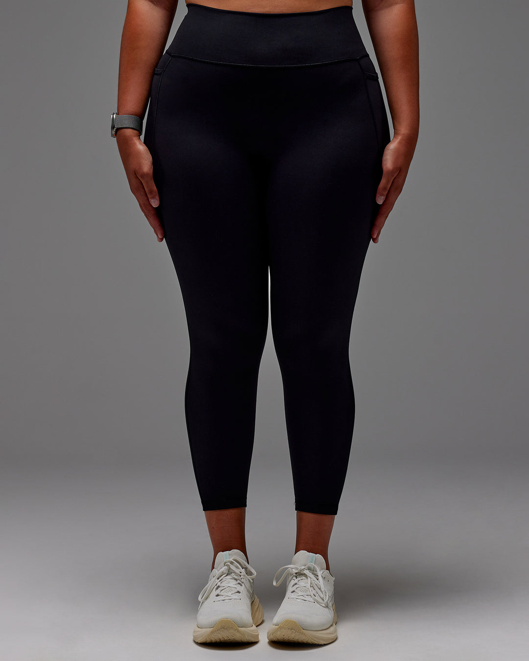 Woman wearing Fusion Ultra High-Rise 7/8 Legging Pockets - Black | Model:Aimee | Size:XL