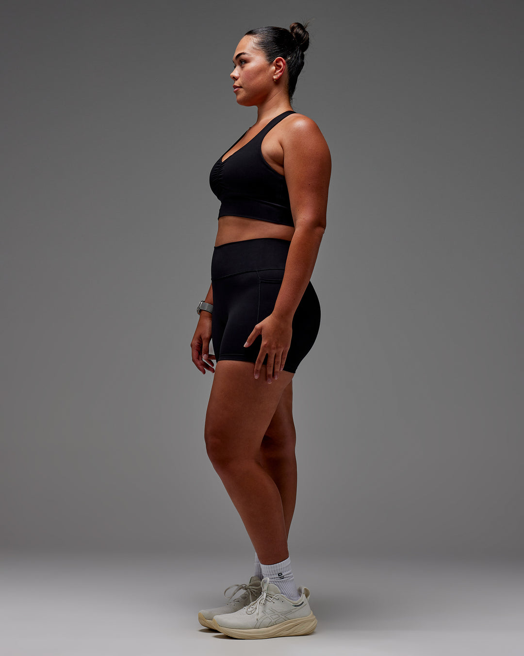 Woman wearing Fusion Ultra High-Rise 4" Short Pockets - Black | Model:Aimee | Size:XL