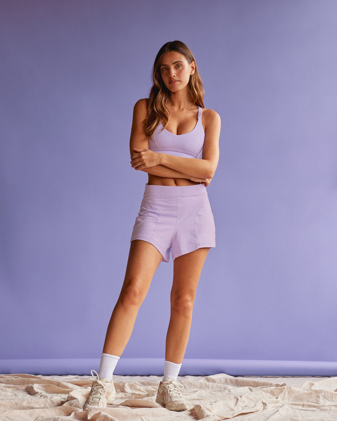 Woman wearing Movement CloudFLX 3" Short - Orchid Bloom Marl | Model:Beatriz | Size:XS