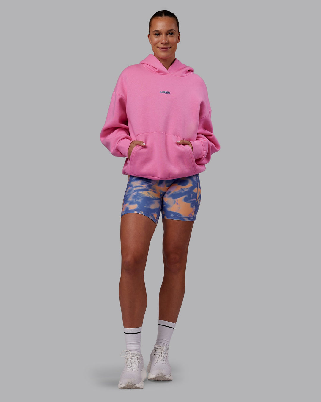 Woman wearing CFT BNE 25 Oversized Hoodie - Candy Pink-Purple Opulence | Model:Charlize | Size:XS