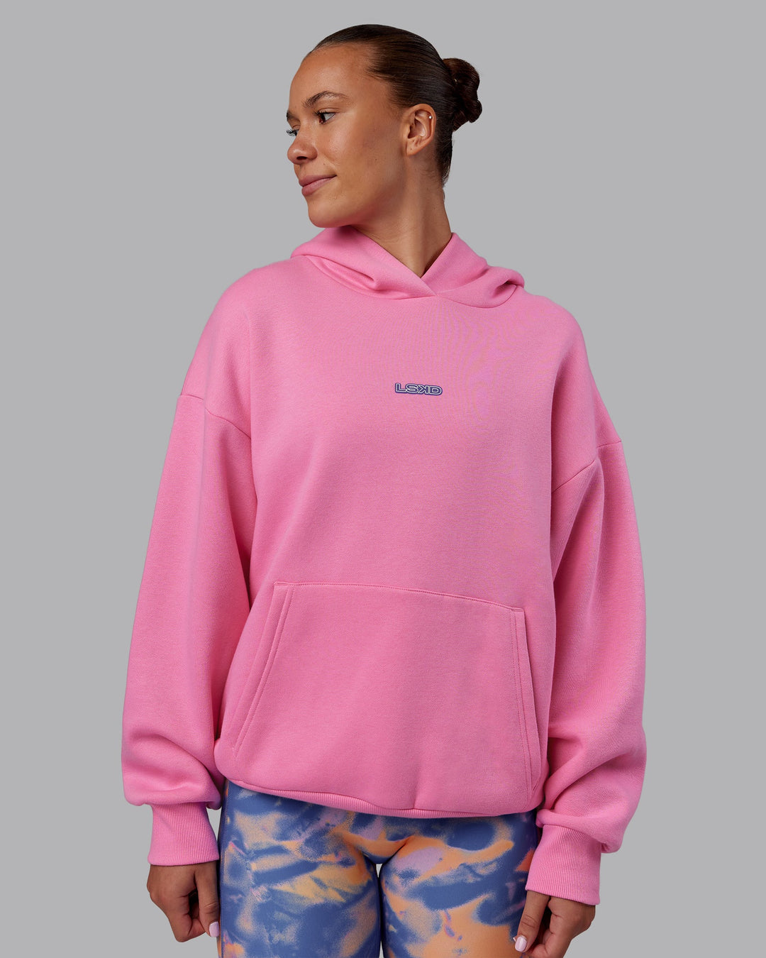 Woman wearing CFT BNE 25 Oversized Hoodie - Candy Pink-Purple Opulence | Model:Charlize | Size:XS