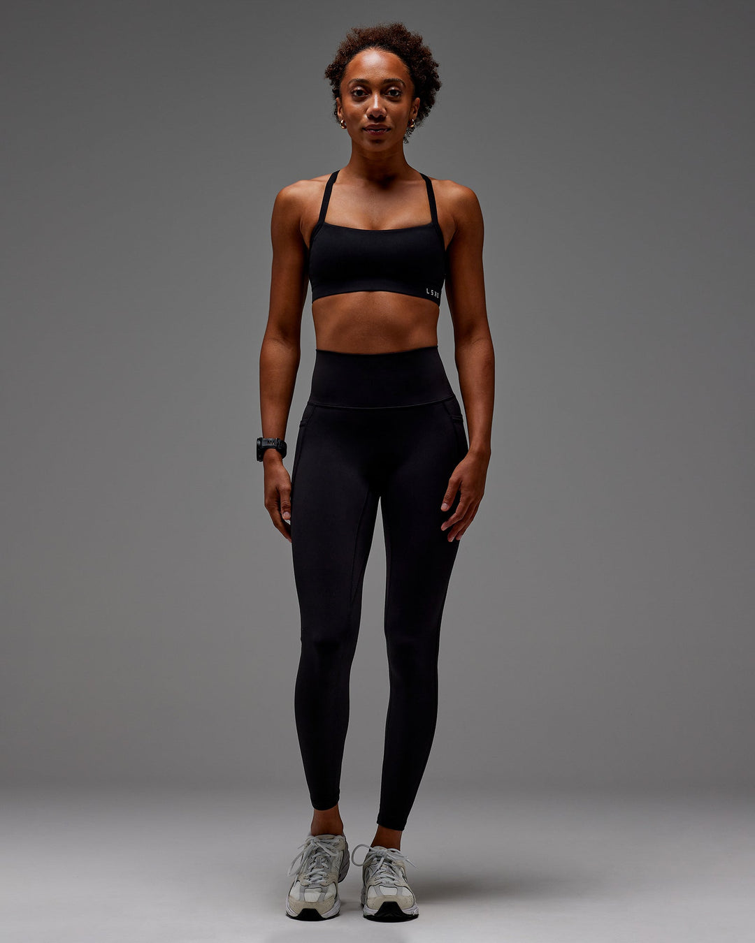 Woman wearing Fusion Ultra High-Rise Full Length Legging Pockets - Black | Model: Txai | Size:XS