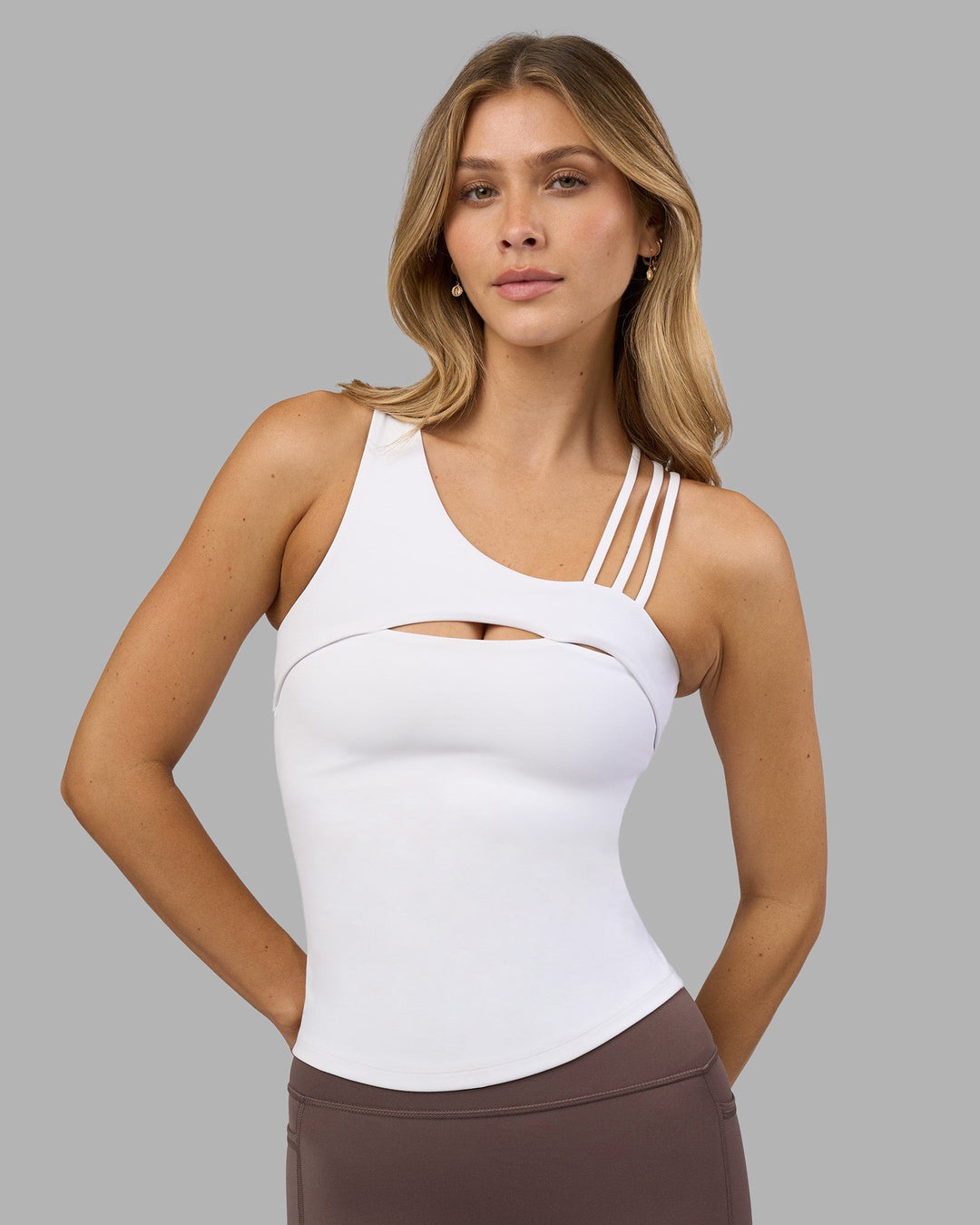 Woman wearing Galvanise Splice Shelf Bra Tank - White | Model:Leilani | Size:XS
