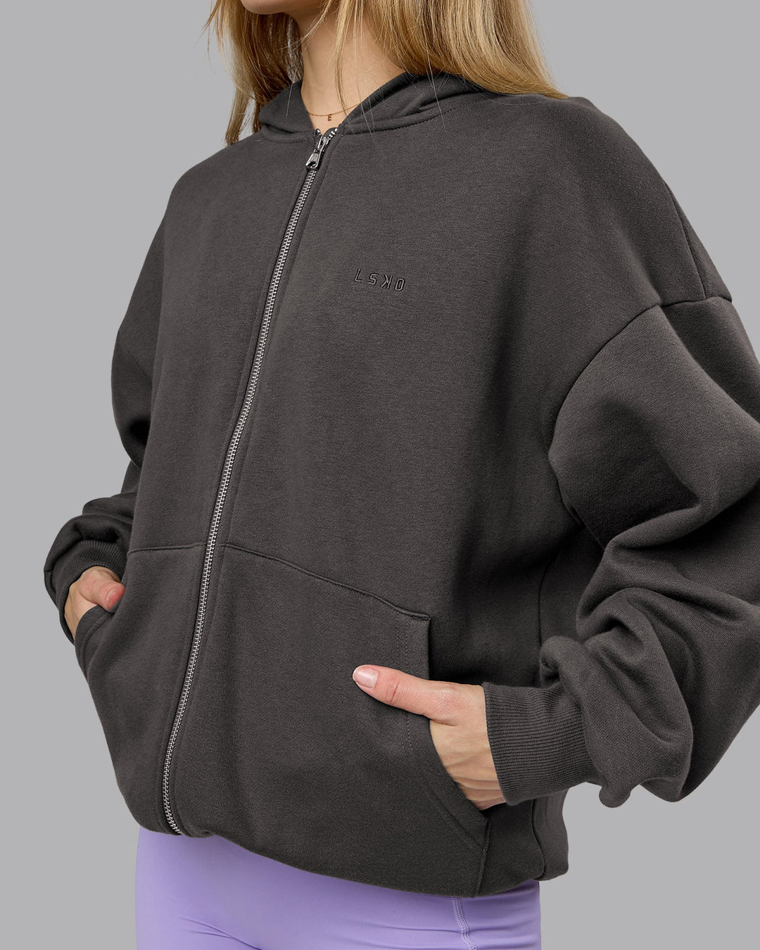 Woman wearing MVP Zip Through Oversized Hoodie - Dark Storm | Model:Emilie | Size:XS