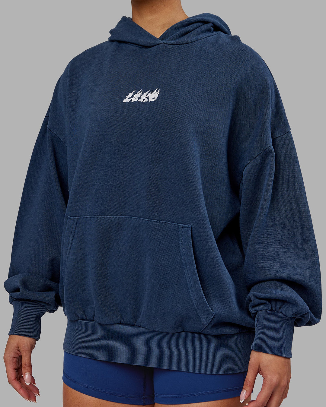 Woman wearing NY25 Washed Oversized Hoodie - Future Navy-Ultra Orange | Model:Ayla | Size:XS