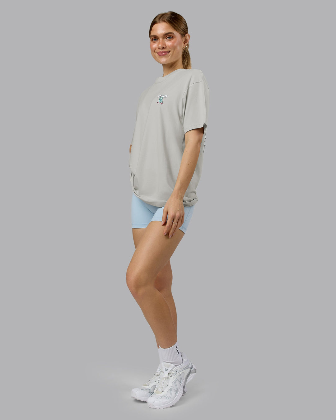 Woman wearing Perspective FLXCotton Oversized Tee - Digital Mist-White | Model:Emilie | Size:XS