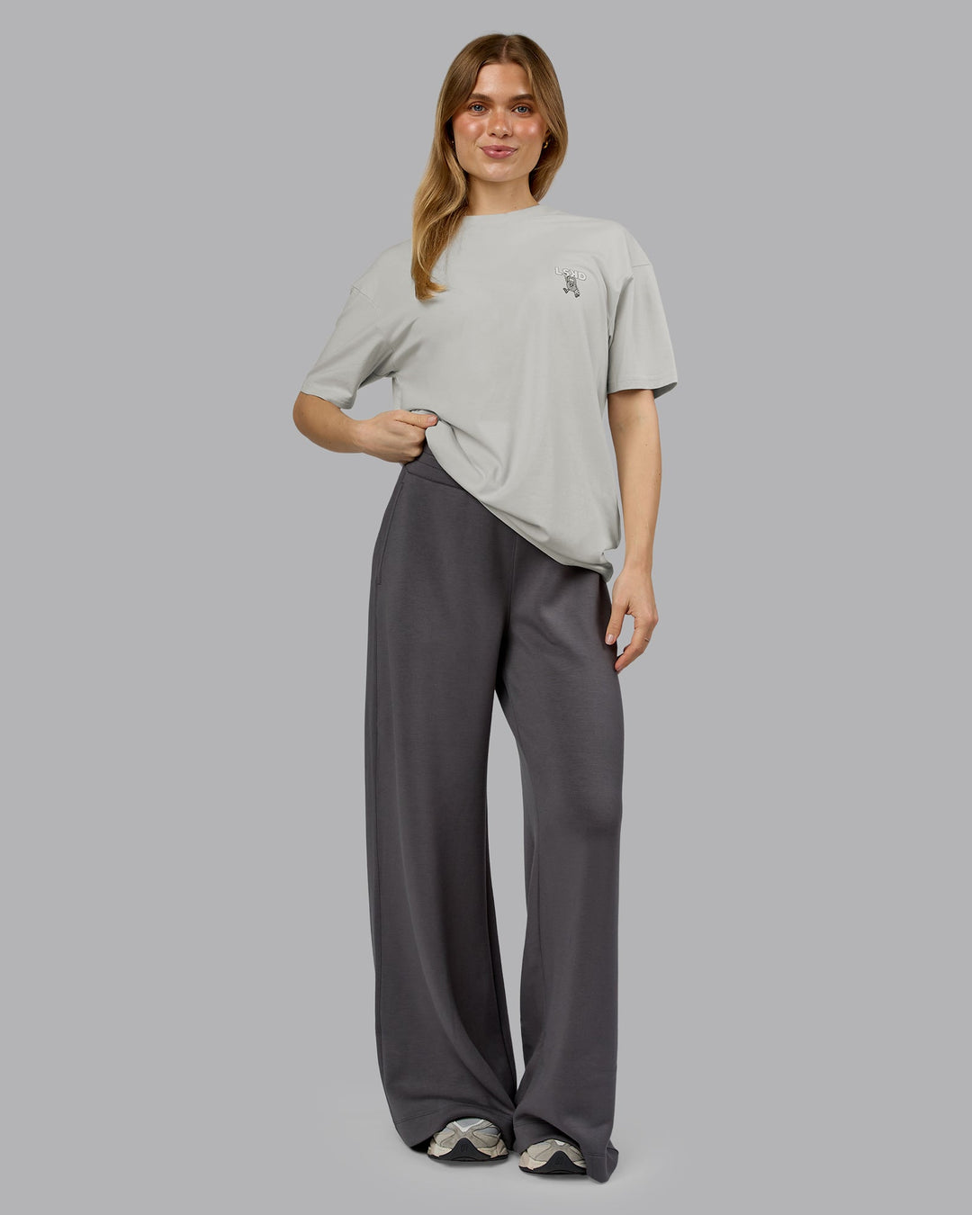 Woman wearing Perspective FLXCotton Oversized Tee - Digital Mist-White | Model:Emilie | Size:XS