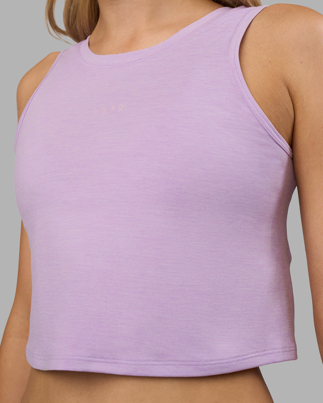 Woman wearing Restore CloudFLX Tank - Orchid Bloom Marl | Model:Leilani | Size:XS