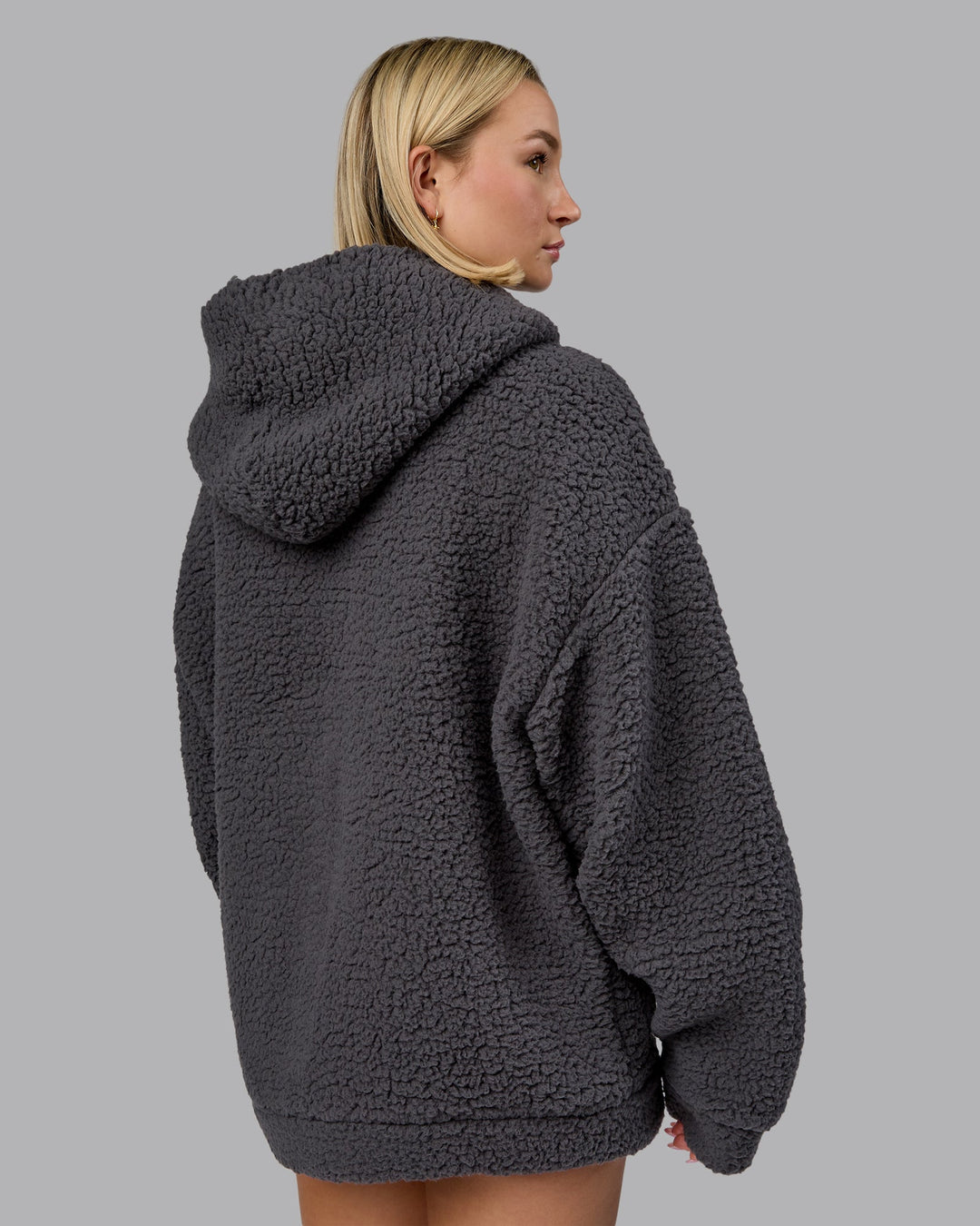 Woman wearing Sherpa Oversized Jacket - Dark Storm | Model:Halle | Size:XS