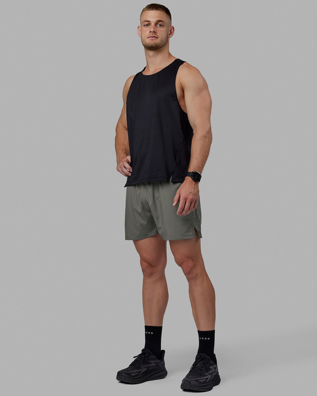 Man wearing Pace 5" Lined Performance Short - Graphite-Reflective