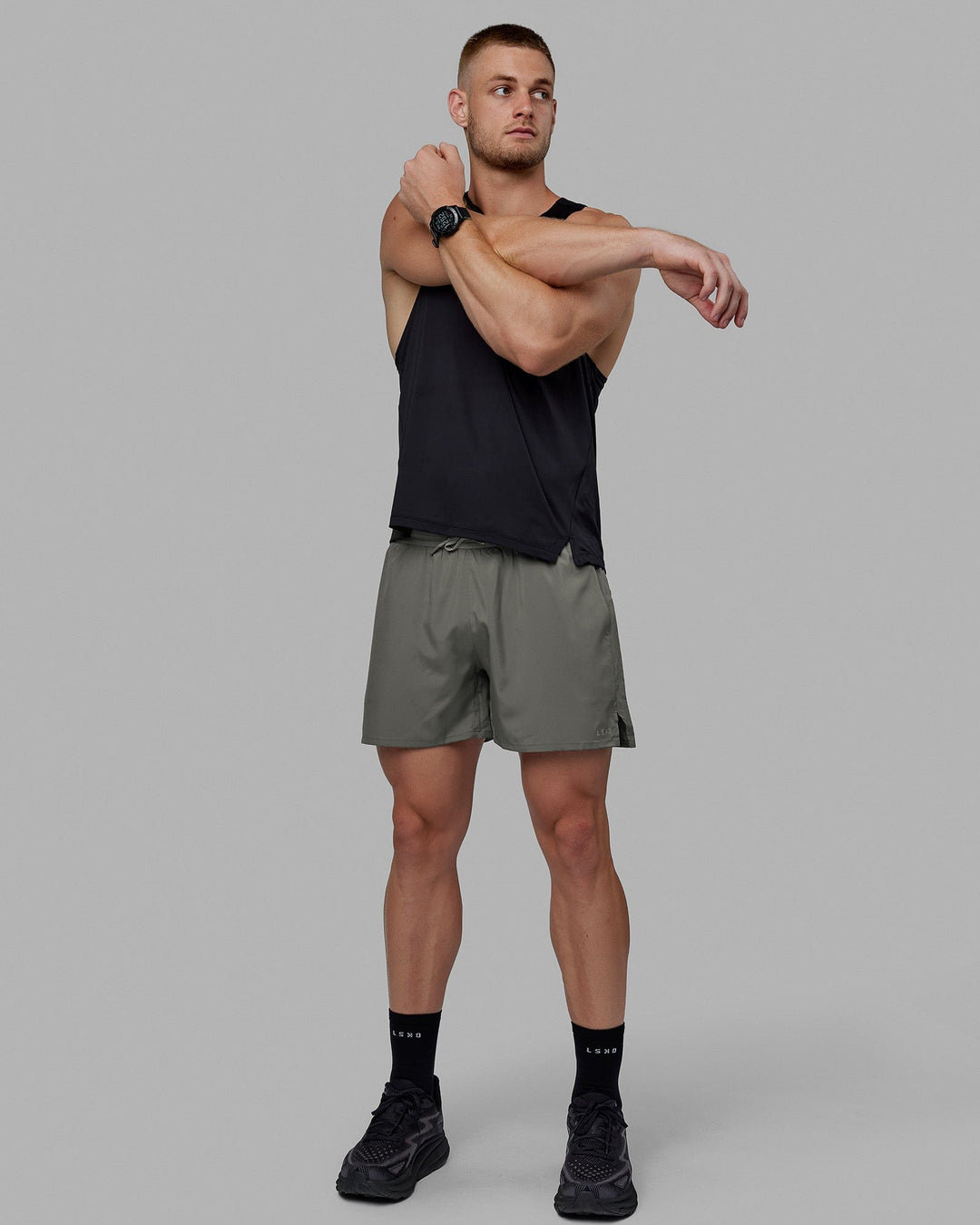 Man wearing Pace 5" Lined Performance Short - Graphite-Reflective