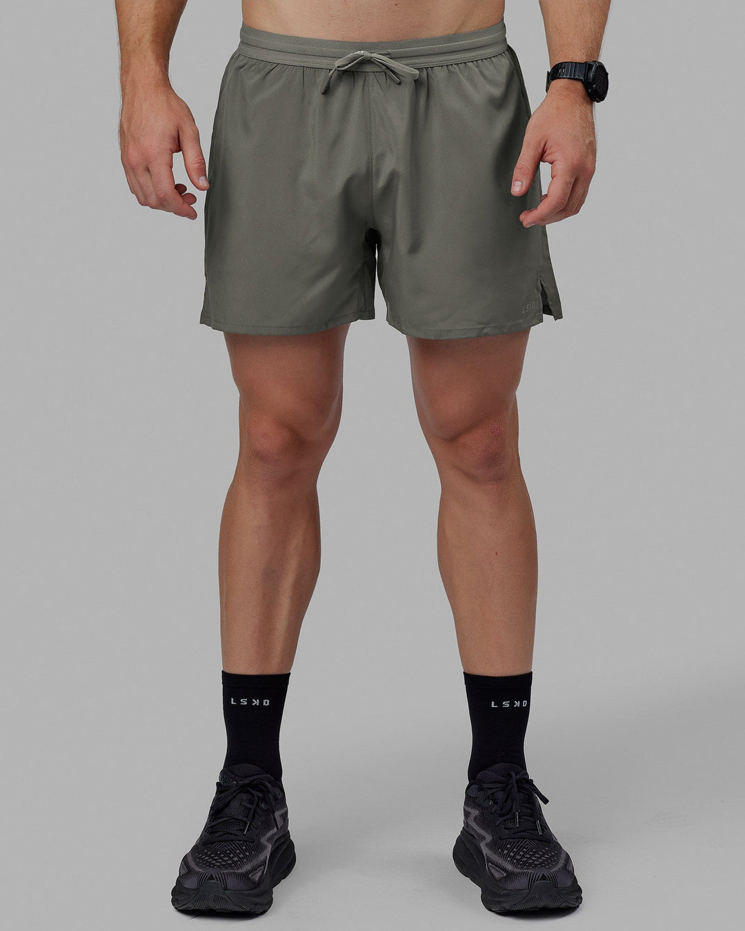 Man wearing Pace 5" Lined Performance Short - Graphite-Reflective