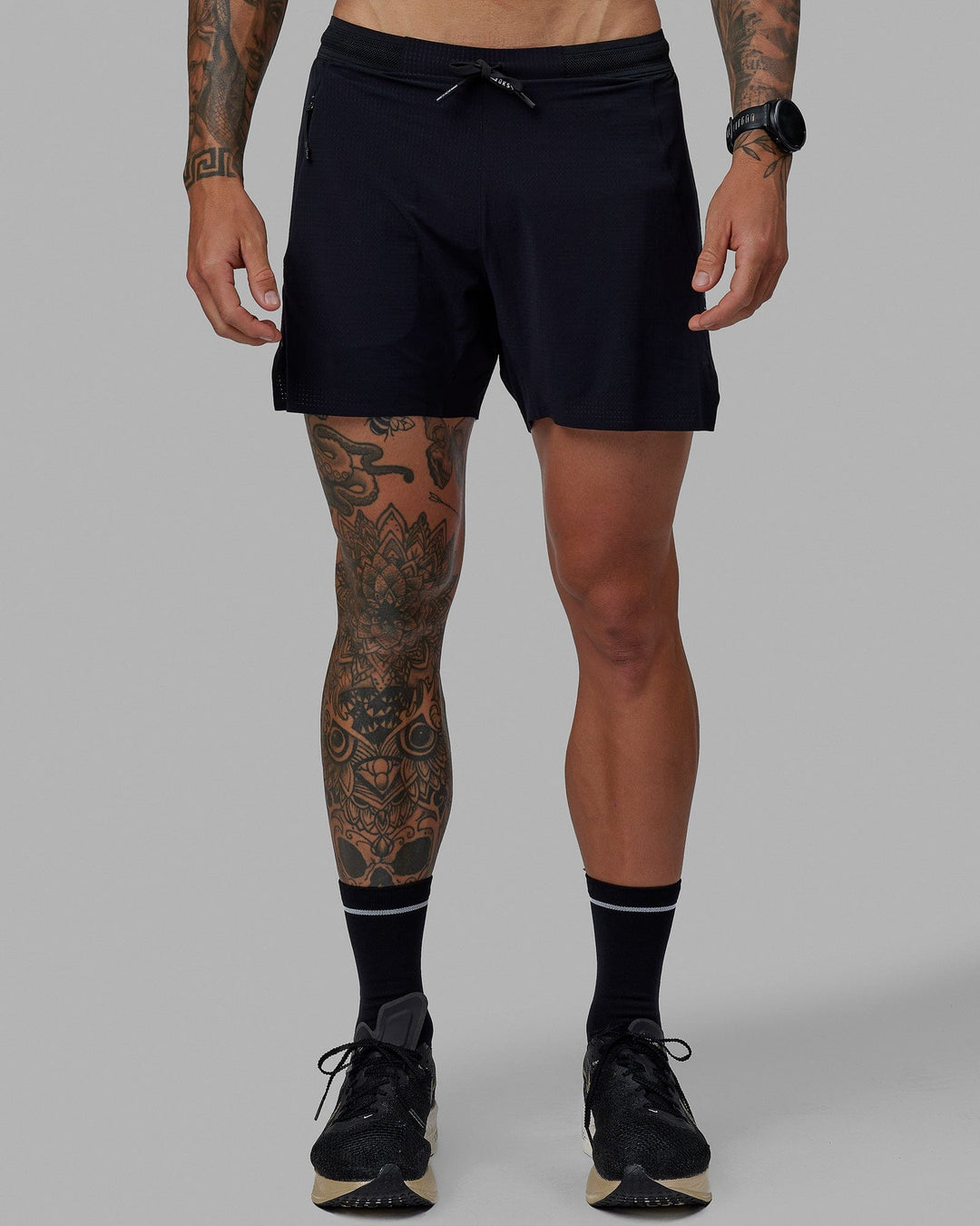 Man wearing UltraAir 5" Lined Performance Short - Black-Reflective