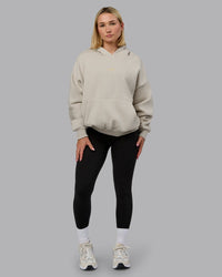 Woman wearing MVP Oversized Hoodie - Shale Beige | Model:Halle | Size:XS | Thumbnail Index: 1