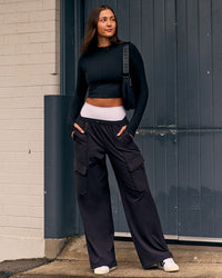 Woman wearing Endeavour Cargo Pant - Black | Thumbnail Index: 2