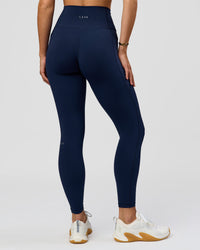 Woman wearing O.G. Fusion Ultra High-Rise Full Length Legging Pockets - Future Navy | Model:Amity| Size:S | Thumbnail Index: 7