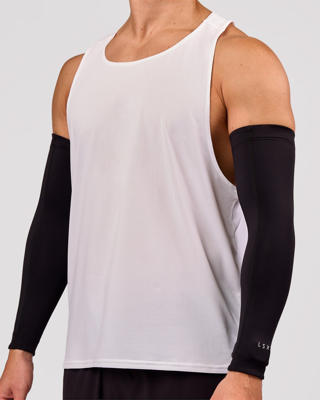 Man wearing Pace Run Sleeves - Black - view 5