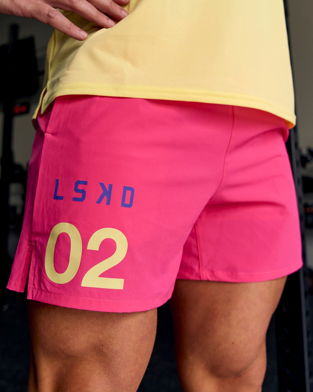 Man wearing Pace 5" Lined Running Short - Game Plan Ultra Pink - view 1