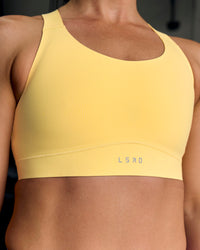 Woman wearing Fusion Sports Bra 2.0 - Lemon | Thumbnail Index: 12