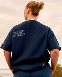 Woman wearing GG Heavyweight Oversized Tee - Future Navy | Model:Carole | Size:M | Thumbnail Index: 0