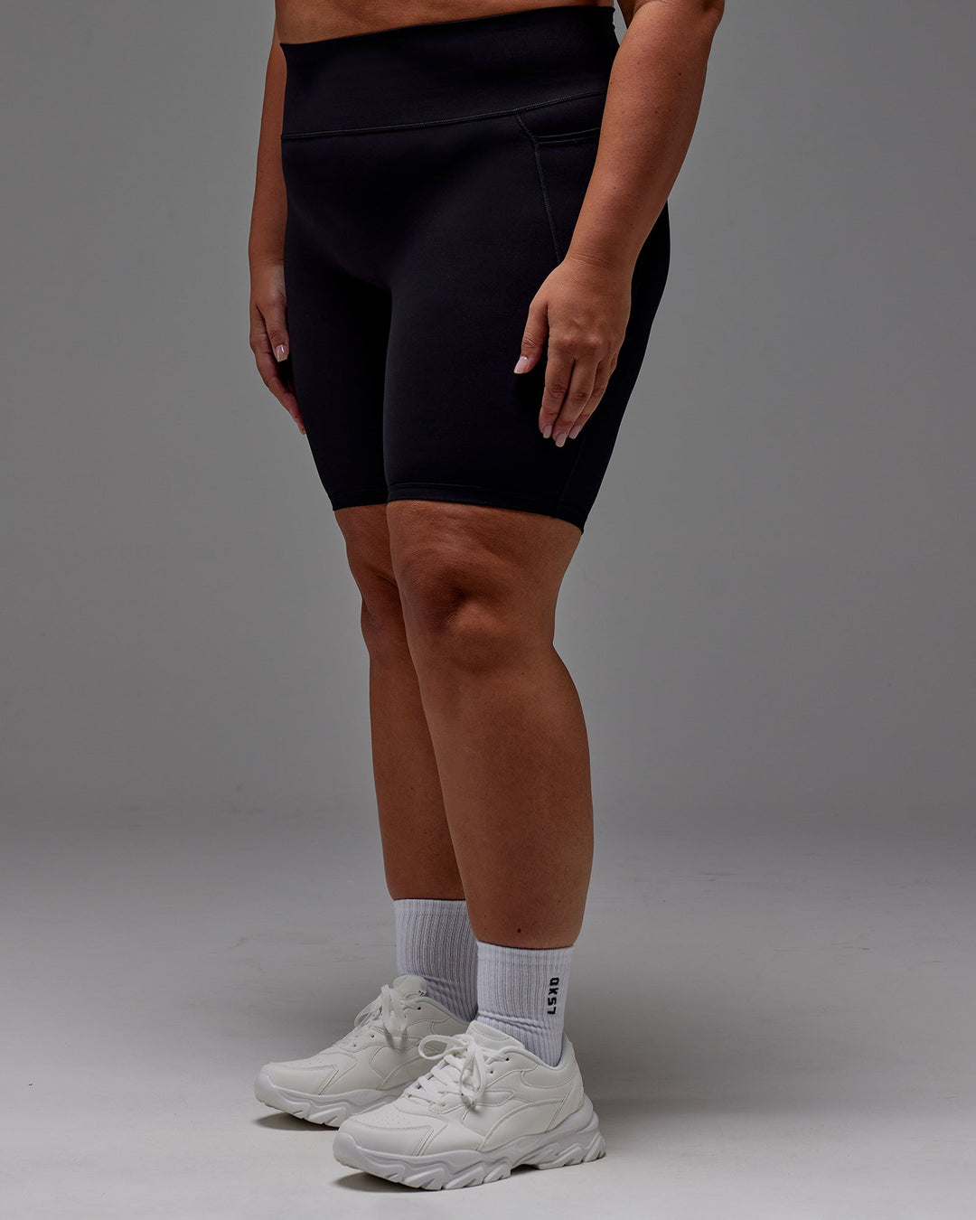 Woman wearing Fusion Bike Short With Pockets in Black | Size:2XL