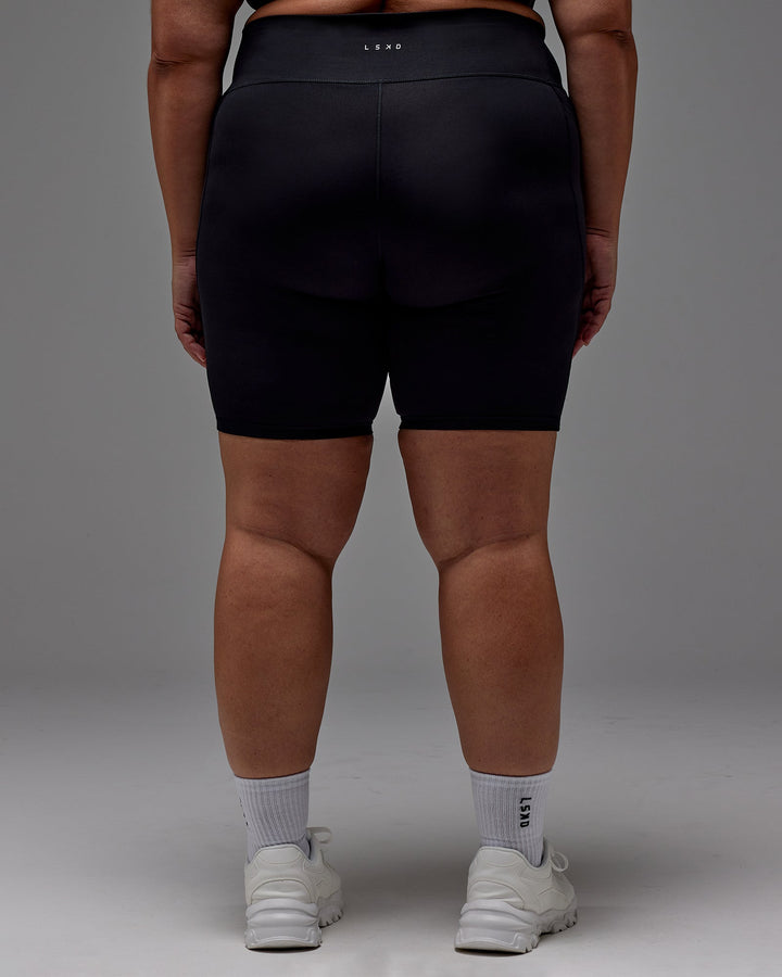 Woman wearing Fusion Bike Short With Pockets in Black | Size:2XL
