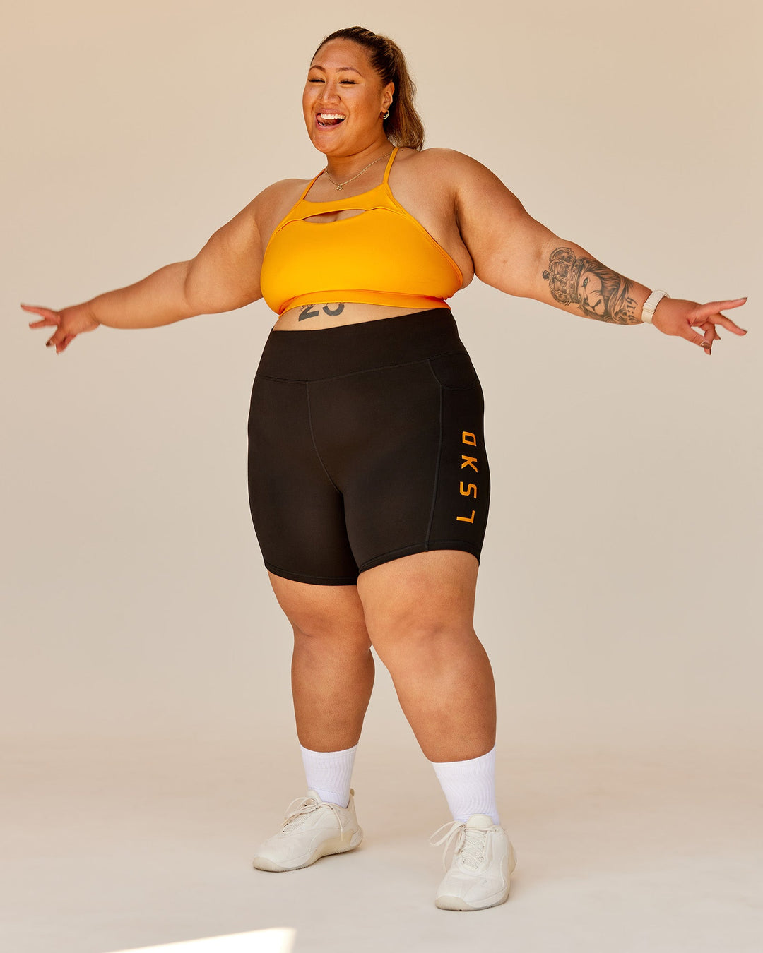 Woman wearing Be Bold Sports Bra - Zinnia | Model:Lilz | Size:3XL