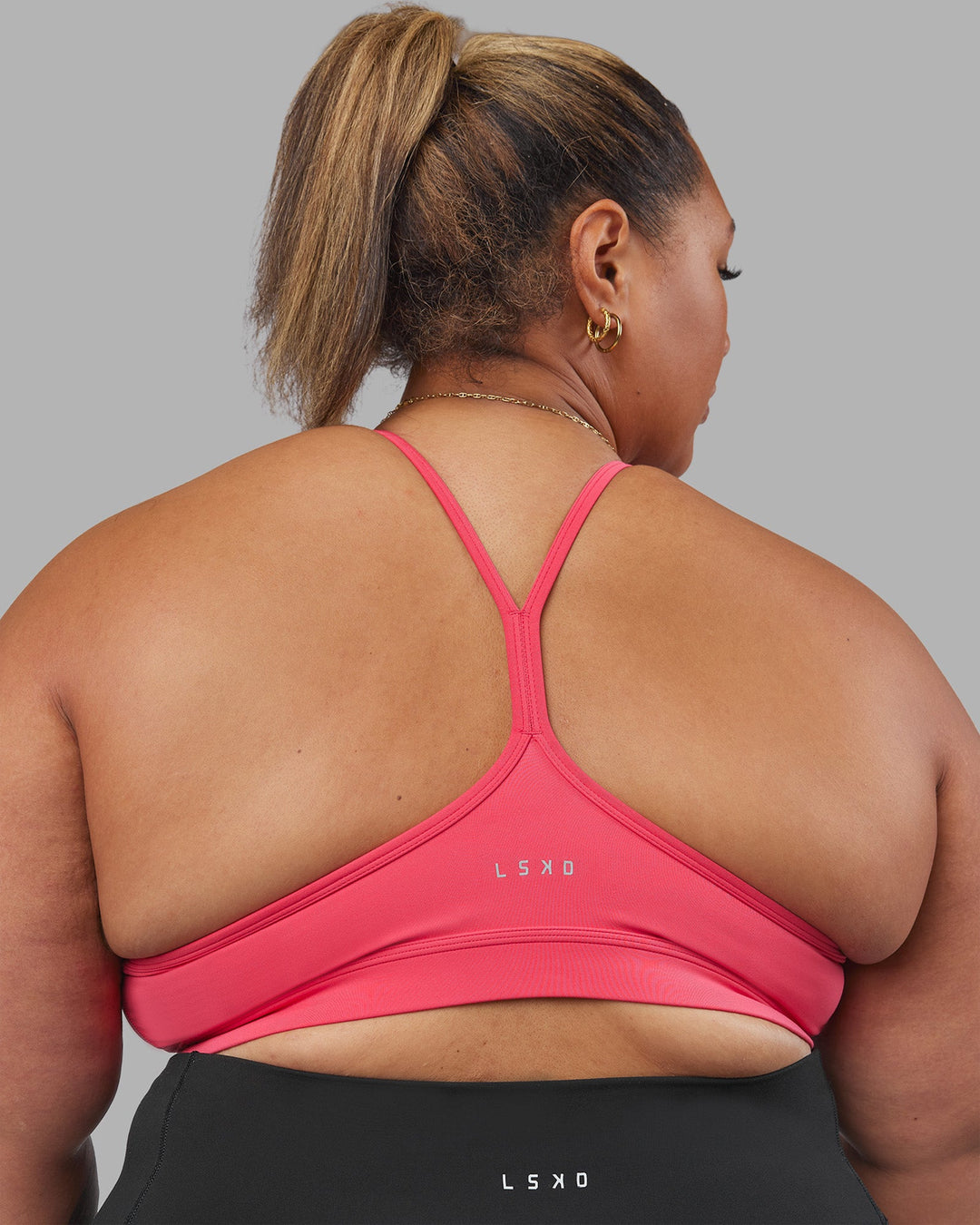 Woman wearing Be Bold Sports Bra - Bright Raspberry | Model:Lilz | Size:3XL