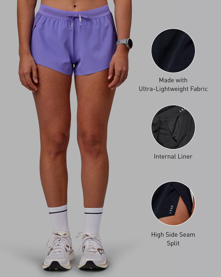 Woman wearing Accelerate Run Shorts - Dahlia Purple
