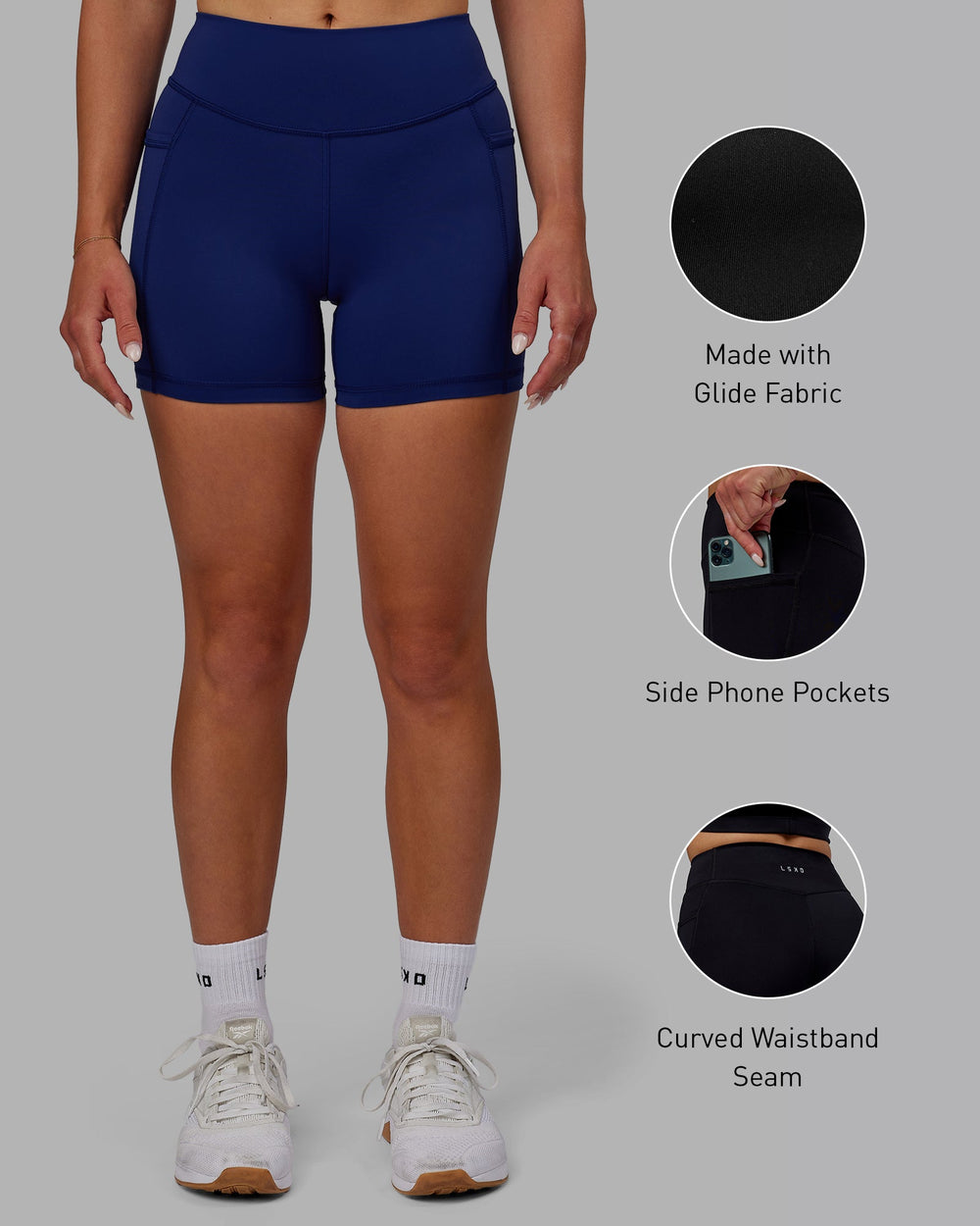 Woman wearing Elite X-Length Shorts - Midnight Blue