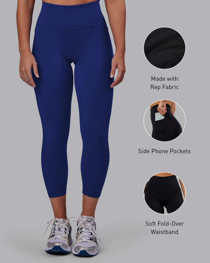 Woman wearing Fusion 7/8 Length Leggings - Midnight Blue
