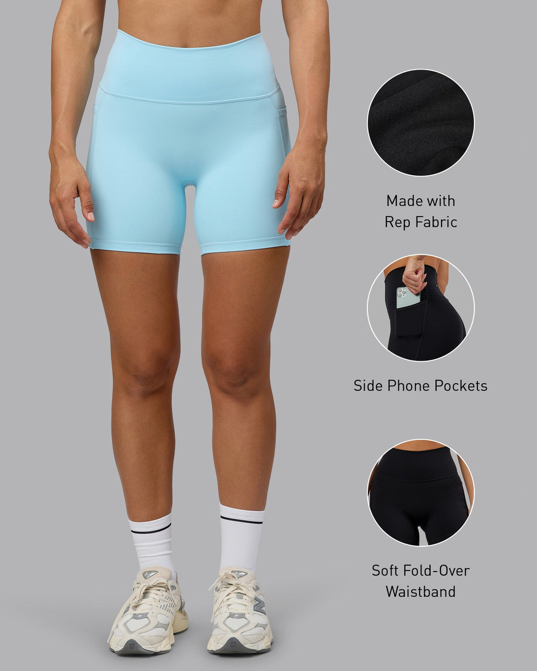 Woman wearing Fusion Mid Short Tights with Pockets - Crystal Blue