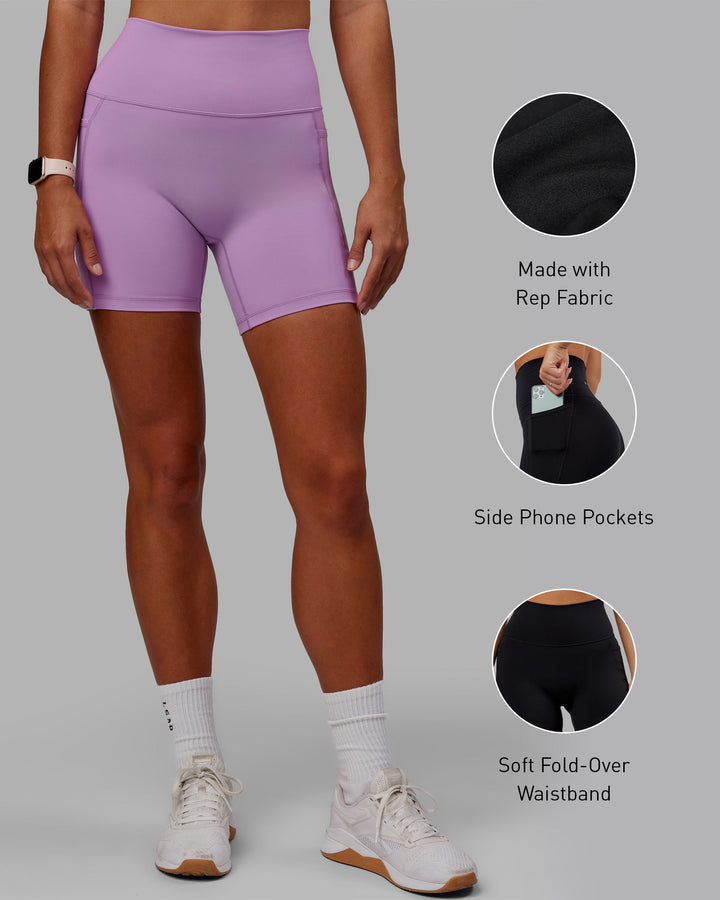 Woman wearing Fusion Mid-Length Shorts - Light Violet
