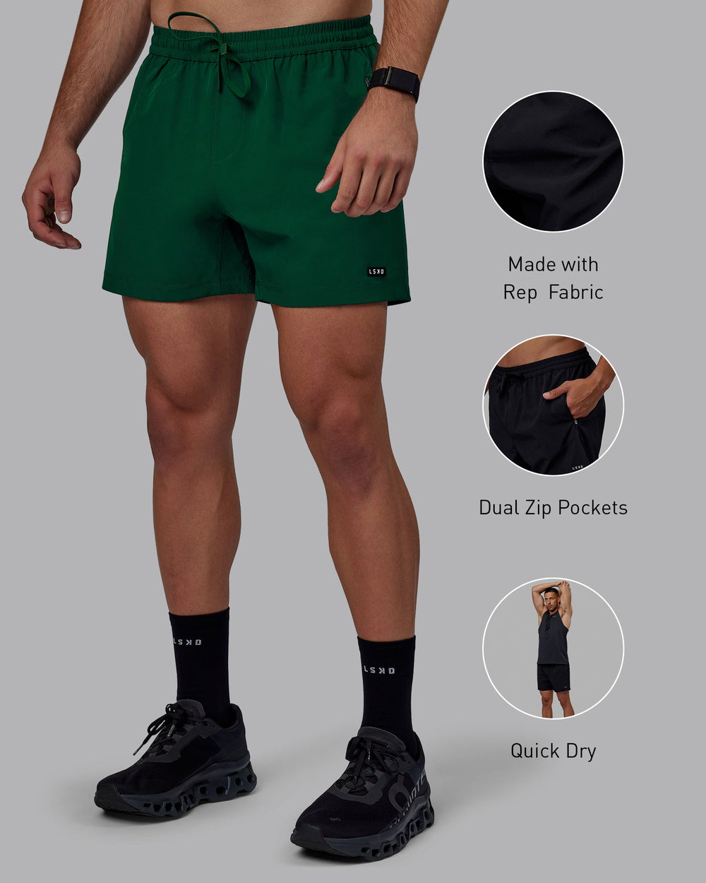 Man wearing Rep 5" Performance Shorts - Deep Emerald