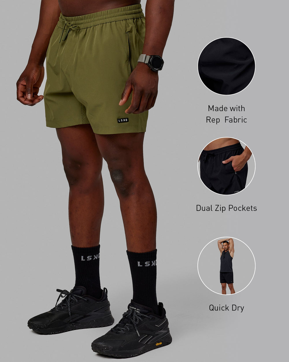 Man wearing Rep 5'' Performance Shorts - Moss