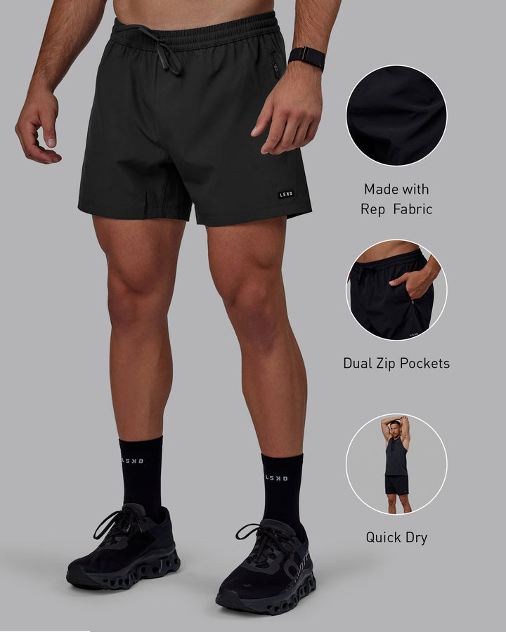 Man wearing Rep 5&quot; Performance Shorts - Pirate Black
