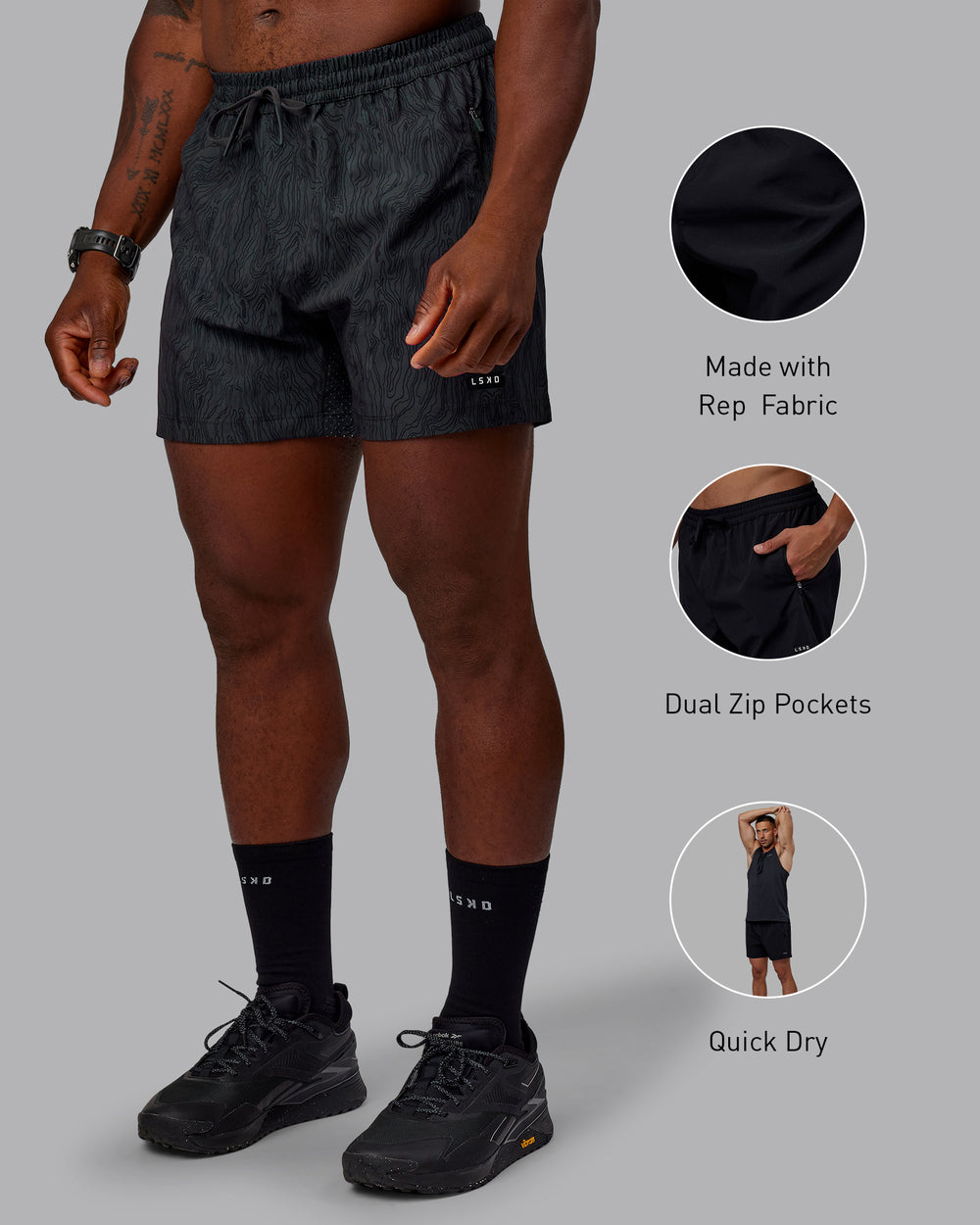 Man wearing Rep 5" Performance Shorts - Topographic Black 