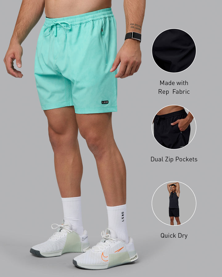 Man wearing Rep 7&quot; Performance Shorts - Digital Camo Cockatoo
