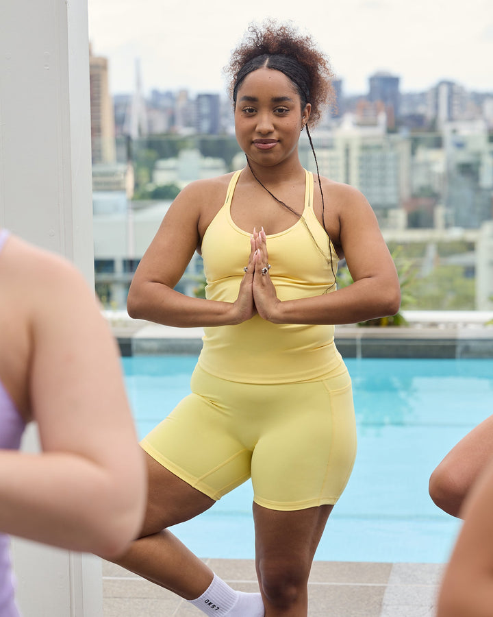 Woman wearing Balance Active Shelf Bra Tank - Lemon
